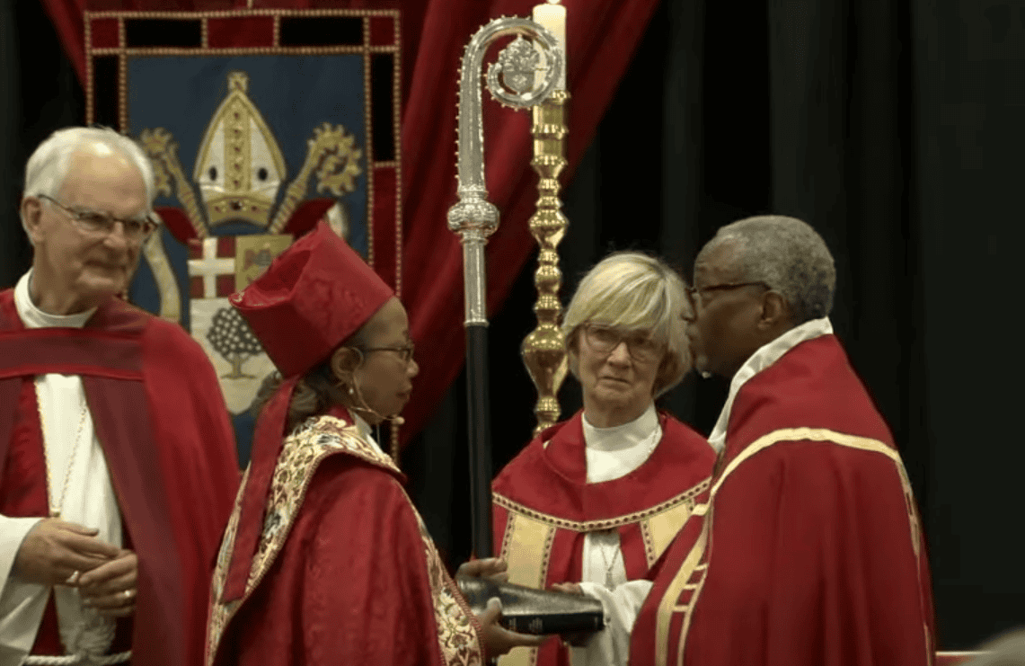 New Bishop of the Episcopal Church of Mississippi Dorothy Wells stands with The Most Reverend Michael Curry.
