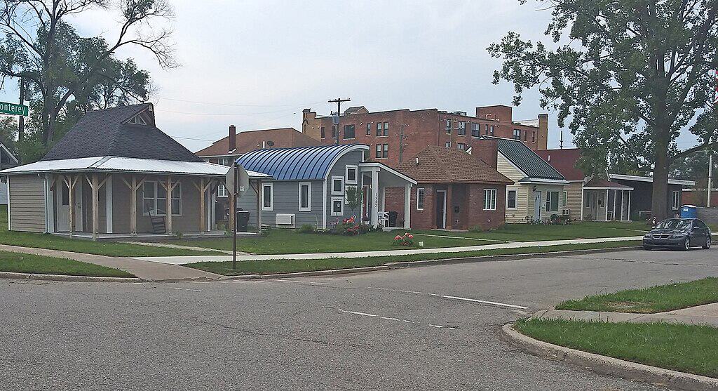 A row of tiny homes on a street.