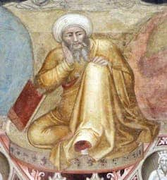 A faded, colored fresco of a man with a beard, seated, wearing a golden robe and a white turban.