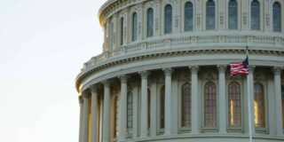 A portion of the US capitol building as seen from outside.