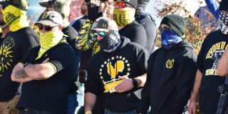 A group of masked Proud Boys.