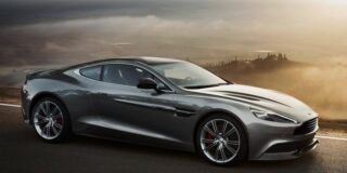 Aston Martin sedan at sunrise